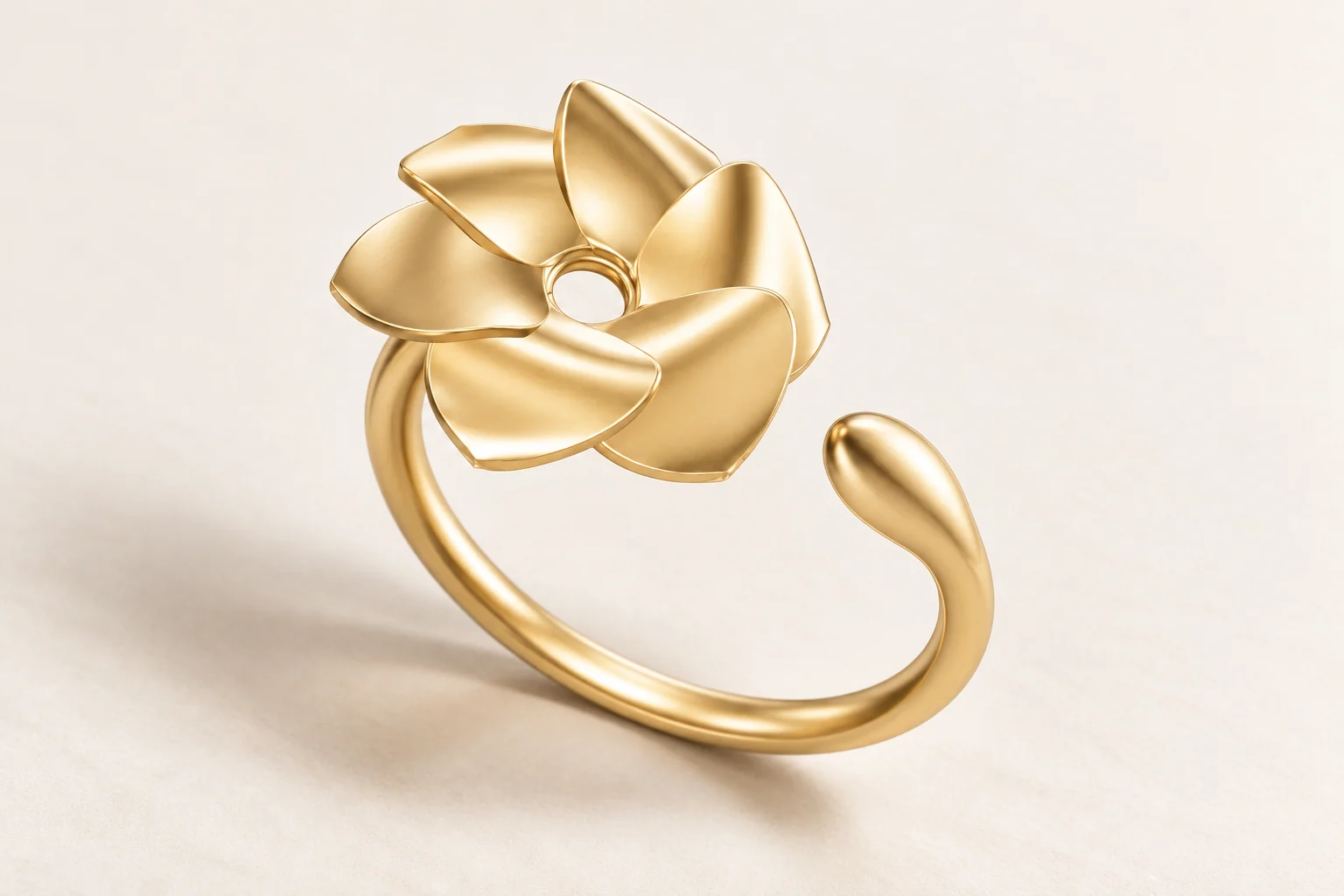 Illustrative Statira open ring with a six-petal flower and a smooth teardrop facing across a gap
