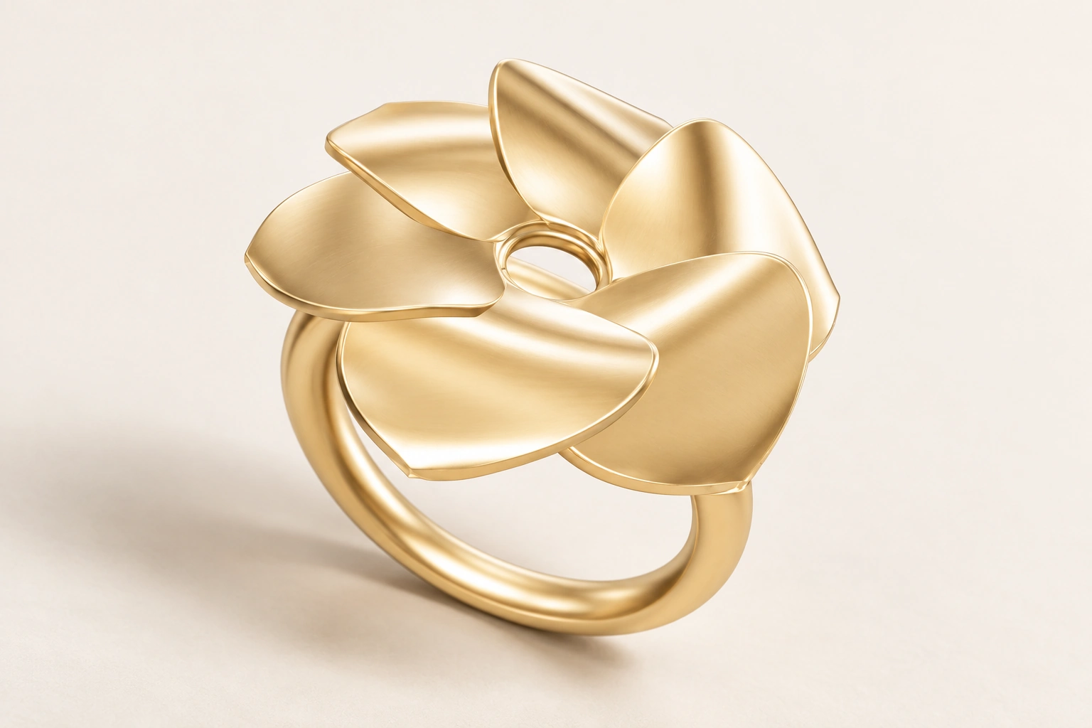 Illustrative studio study of a six-petal flower ring with an open center and a slender band